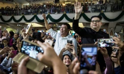 Un sosie du président philippin Rodrigo Duterte et celui du numéro-un nord-coréen Kim Jong Un ont suscité étonnement et stupeur lors d'un service religieux à Hong Kong, le 3 février 2019.