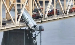 A driver was dramatically rescued from a truck in Kentucky Friday after it crashed through the bridge's guardrail, according to local reports. (Fox News)