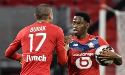 Jonathan David et Burak Yilmaz lors du match de Ligue 1 contre Lyon, le 25 avril 2021