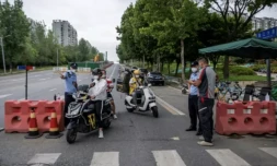 Covid: des millions d'habitants confinés dans l'une des plus grandes villes de Chine