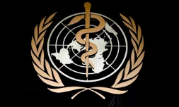 Photo prise le 9 mars 2020 du logo de l'Organisation mondiale de la santé à l'entrée de son siÚge à GenÚve