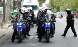 Quelque 130.000 policiers et gendarmes, des unités d'élite et des blindés: dans la foulée des récentes émeutes, le gouvernement a déployé les grands moyens pour tenter de contenir les traditionnels incidents des festivités du 14-Juillet