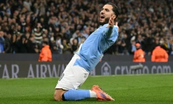 Le milieu Français de Manchester City Rayan Cherki célÚbre son but mercredi soir en Ligue des champions, le quatriÚme de son équipe contre Dortmund.