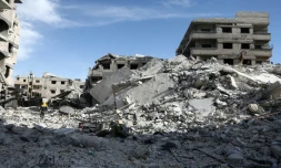 Photo de destructions dans la ville tenue par les rebelles de Saqba, dans la Ghouta orientale, cible de bombardements meurtriers du régime syrien, le 9 mars 2018
