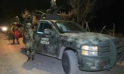 Des militaires montent la garde après une attaque à l'explosif à Tlajomulco de Zuñiga, dans la banlieue de Guadalajara, le 12 juillet 2023 au Mexique