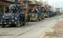 Des forces irakiennes stationnent dans Ramadi pour sécuriser la zone et combattre le groupe EI, le 1er janvier 2016