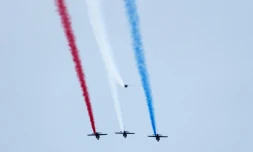 Les Alphajet de la Patrouille de France (PAF) survolent Paris lors d'une répétition, le 9 juillet 2024, avant le défilé annuel du 14 juillet