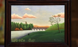 "Paysage avec pêcheur" attribué au Douanier Rousseau exposé au Musée d'Art Naïf et d'Arts Singuliers de Laval (nord-ouest), le 29 août 2017