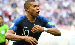 Kylian Mbappé exulte après avoir marqué le 4e but français contre l'Argentine, en 8es de finale de la Coupe du monde, le 30 juin 2018 à Kazan  