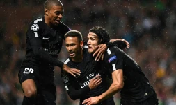 Kylian Mbappé (g), Neymar (c) et Edinson Cavani après l'ouverture du score par le PSG face au Celtic Glasgow, en C1, le 12 septembre 2017 à Glasgow