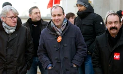 (De G à D) Les secrétaires généraux de Force OuvriÚre Jean-Claude Mailly, de la CFDT Laurent Berger et de la CGT Philippe Martinez manifestent ensemble pour défendre le droit de grÚve, le 18 février 2015 à Paris