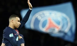 Kylian MbappĂ© fĂȘte son but qui permet au PSG de se qualifier pour la finale de la Coupe de France lors du match contre Rennes le 3 avril 2024 au Parc des Princes Ă Paris