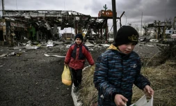 Un magasin d'alimentation sur un important carrefour réduit à des décombres, à Irpin (Ukraine) le 5 mars 2022 
