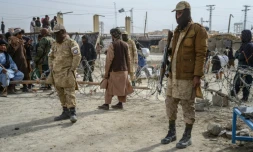 Des agents de sécurité talibans montant la garde près d'un poste-frontière entre l'Afghanistan et le Pakistan, dans le district de Spin Boldak, le 29 décembre 2025
