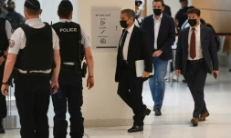 L'ancien président Nicolas Sarkozy (c) arrive pour une audience dans l'affaire Bygmalion au tribnal à Paris, le 15 juin  2021