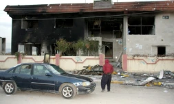 Photo d'un siège d'un parti politique au Kurdistan irakien incendié lors de manifestations, à Piramagroun, dans la province de Souleimaniyeh, le 19 décembre 2017