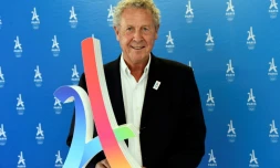 Guy Drut, ancien champion olympique, membre du Comité international olympique (CIO) et ancien ministre des Sports, pose après une interview à la suite de l'obtention des JO 2024, à Paris, le 1er août 2017