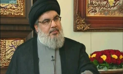 Capture d'écran depuis la chaîne de TV du Hezbollah al-Lanar, le 25 septembre 2015, montrant Le chef du Hezbollah chiite libanais Hassan Nasrallah lors d'un entretien depuis un lieu non spécifié au Liban 