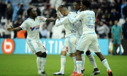 Le Marseillais Rémy Cabella congratulé par ses équipiers après son but contre Montpellier au Vélodrome, le 6 décembre 2015 