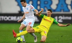 Le milieu de terrain de l'OM Florian Thauvin (G) buteur lors de la réception de Nantes en 28e journée de L1 le 4 mars 2018