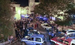 Les sauveteurs italiens regroupés dans le village de Civita en Calabre, le 20 août 2018
