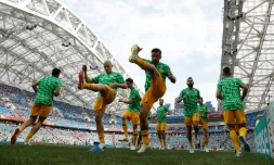Les Australiens accélèrent leur échauffement avant d'affronter le Pérou dans le groupe C du Mondial à Sotchi, le 26 juin 2018