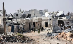 Des forces pro-gouvernementales syriennes dans le village de Minyan, près d'Alep, le 12 novembre 2016