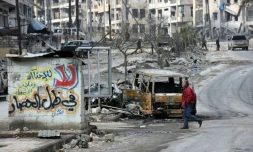 Ruines et voitures éventrées, le 23 décembre 2016 dans le quartier Ansari anciennement détenu par les rebelles, au nord d'Alep