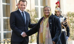 Le président français Emmanuel Macron accueille le 12 décembre 2017 à Paris la Première ministre du Bangladesh Sheikh Hasina pour un sommet sur le climat 