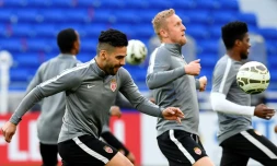 Le Monégasque Radamel Falcao (g), le 31 mars 2017 à Lyon à la veille de la finale de la Coupe de la Ligue avec ses coéquipiers Kamil Glik et Jemerson