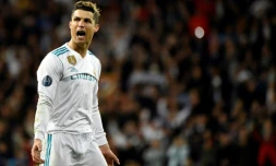 L'attaquant vedette du Real Madrid Cristiano Ronaldo exulte après avoir inscrit un but en quarts retour de C1 à Santiago Bernabeu, le 11 avril 2018   