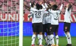 Les joueurs lillois célÚbrent l'ouverture du score, lors du match de L1, le 16 décembre à Dijon