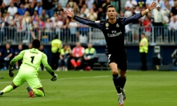 L'attaquant du Real Madrid Cristiano Ronaldo exulte après avoir ouvert le score pour le Real Madrid face à Malaga, le 21 mai 2017 à Malaga