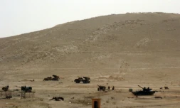 Des troupes syriennes déployées dans la ville syrienne de Palmyre le 24 mars 2016 