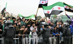 Des Syriens célÚbrent le premier anniversaire de la chute de l'ancien président Bachar al-Assad à Damas, le 8 décembre 2025