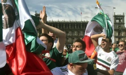 Mexico fans gathered in the capital's main Zocalo square erupt as their team defeated Germany at the World Cup