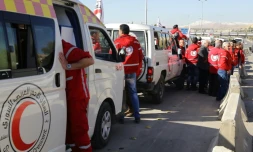 Des camions du Croissant Rouge sur le point de quitter Damas le 17 février 2016 à destination de plusieurs villes assiégées