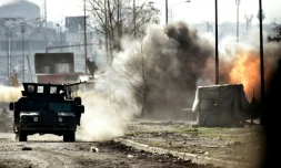 Combats entre les forces progouvernementales et jihadistes de l'EI à Mossoul, en Irak, le 5 mars 2017