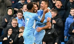 Les joueurs de Manchester City, vainqueurs d'Everton à domicile en championnat, le 21 novembre 2021, attendent le PSG pour un choc de Ligue des champions