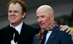 Le réalisateur français Jacques Audiard (D) et l'acteur américain John C. Reilly (G) arrivent pour la première de "Les Frères Sisters" ("Sisters Brothers") en compétition à la Mostra de Venise , le 2 septembre 2018