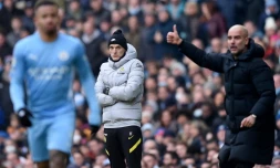 Les entraîneurs Thomas Tuchel (G) et Pep Guardiola (D) lors d'un match de Premier League entre Chelsea et Manchester City, le 15 janvier 2022 à l'Etihad Stadium