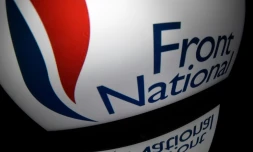 Le logo du Front National sur l'écran d'une tablette le 13 octobre 2016 à Paris