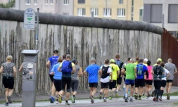 Des participants de l'ultra-marathon de la mémoire s'entraßnent à la veille de la course, à Berlin le 16 août 2019