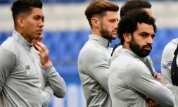 L'attaquant Mohamed Salah (d) lors d'une séance d'entraînement avec ses coéquipiers de Liverpool, le 1er mai 2018 à Rome