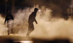 Des Palestiniens lors de heurts avec les forces de sécurité israéliennes le 3 octobre 2015 à Jérusalem