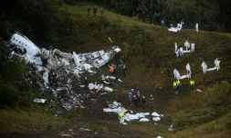 Sur le site du crash d'un avion dans la zone montagneuse d'El Gordo, à environ 50 km de Medellin, en Colombie, le 29 novembre 2016