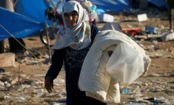 Photo prise dans un camp de déplacés syriens, le 2 juillet 2018, dans la région de Nassib (sud de la Syrie)