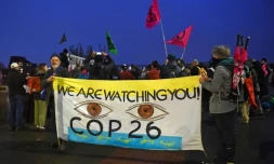 Des militants d'Extinctin Rebellion manifestent pendant la COP26, le 8 novembre 2021 à Glasgow, en Ecosse