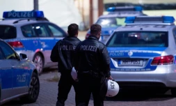 Des policiers devant le centre d'enregistrement des réfugiés à Hambourg en Allemagne, le 1er octobre 2015