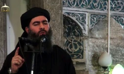 Capture d'écran d'une vidéo de propagande diffusée le 5 juillet 2014 lors d'une adresse présumée du chef du groupe Etat islamique (EI), Abou Bakr al-Baghdadi, dans une mosquée de Mossoul, dans  le nord de l'Irak